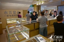 济南人在两个“平行世界”里买金 金价下跌引发不同反应