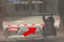 妻子怀疑丈夫出轨挂车尾跟踪 民警及时制止险情